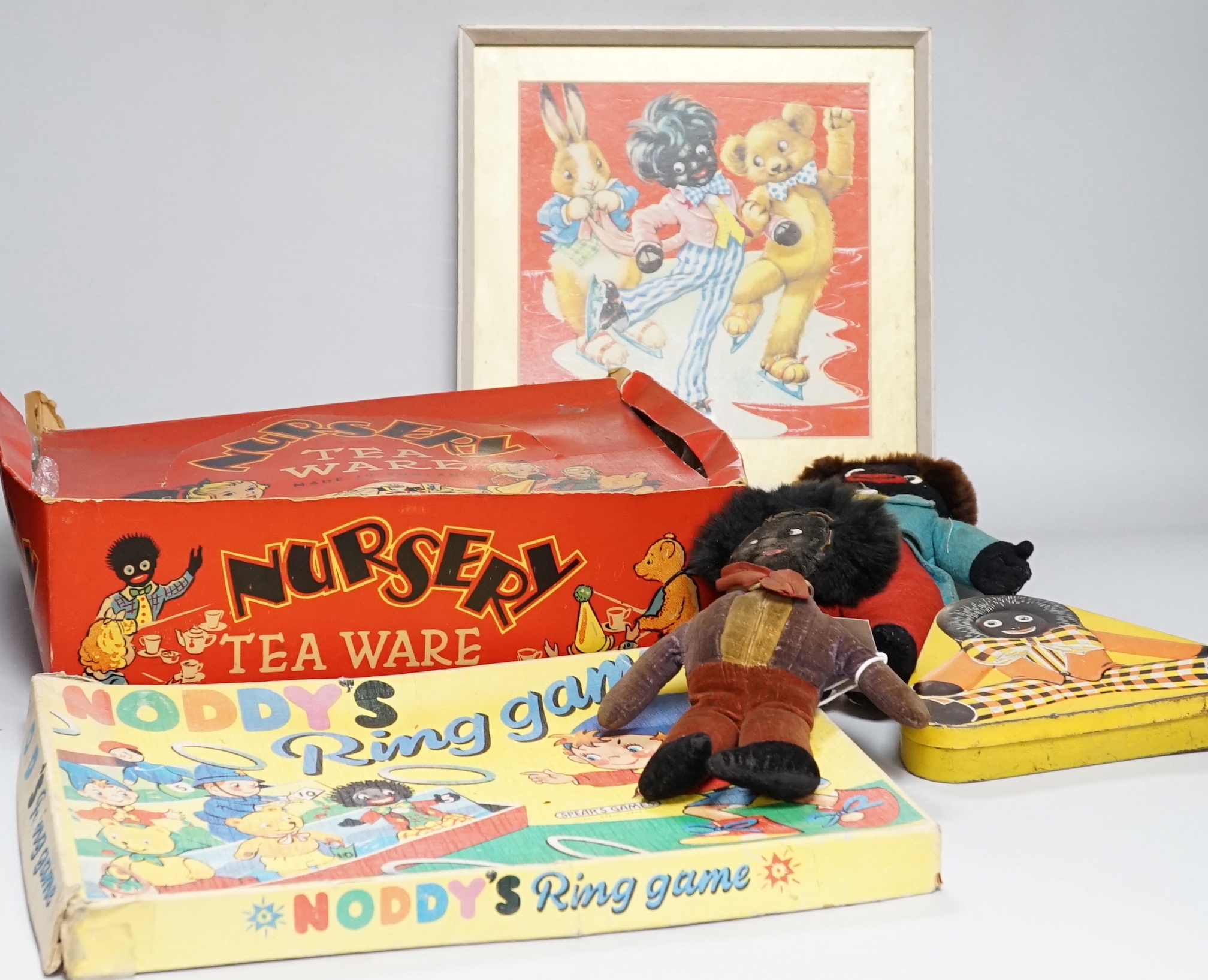 Noddy game, a golly and bear framed picture, a boxed child's teaset , a golly tin box, a Merrythought golly and a Norah Wellings golly